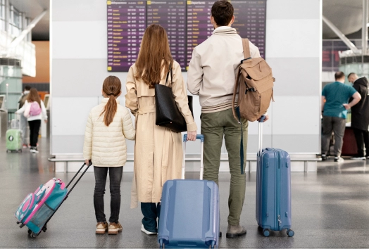 Family checking flight information on display.